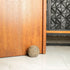 Grey decorative doorstopper